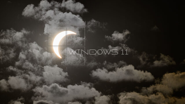 Windows 11 Logo with Solar Eclipse in Moody Clouds 4K Wallpaper