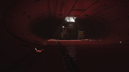 Futuristic Sci-Fi Tunnel with Equipment and Mysterious Light 4K Desktop Wallpaper