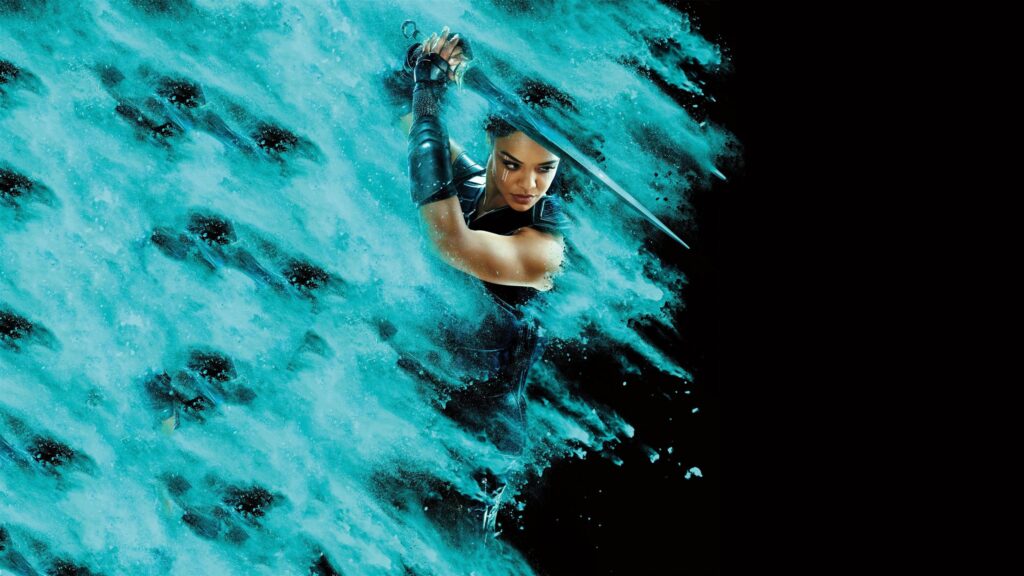 Tessa Thompson as Valkyrie with Blue Powder Explosion Marvel Desktop Wallpaper