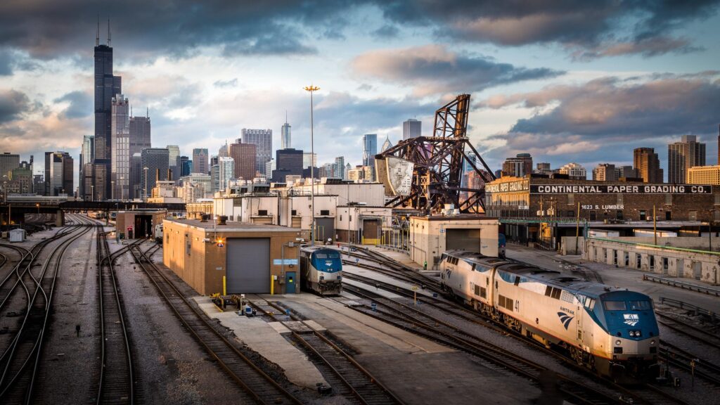 Chicago Skyline and Amtrak Train Yard at Sunset Desktop Wallpaper