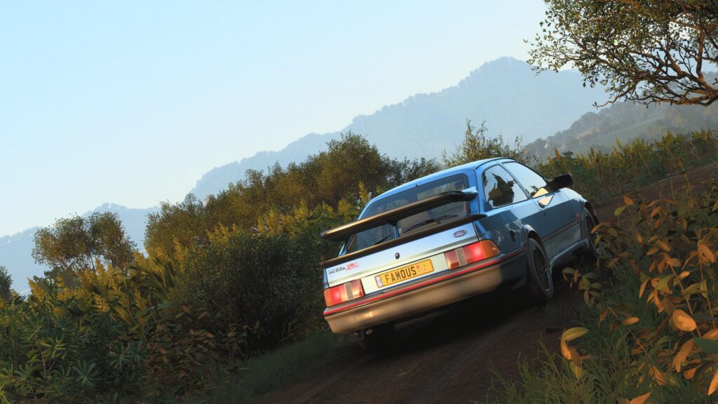 Classic Ford Sierra XR4i on Country Road at Sunset Desktop Wallpaper