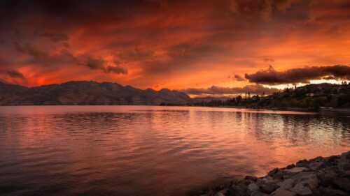 Stunning Fiery Sunset Over Serene Mountain Lake Landscape 4K Wallpaper