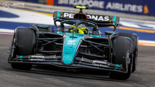 Mercedes-AMG Petronas Formula 1 Racing Car High-Speed Action Desktop Wallpaper