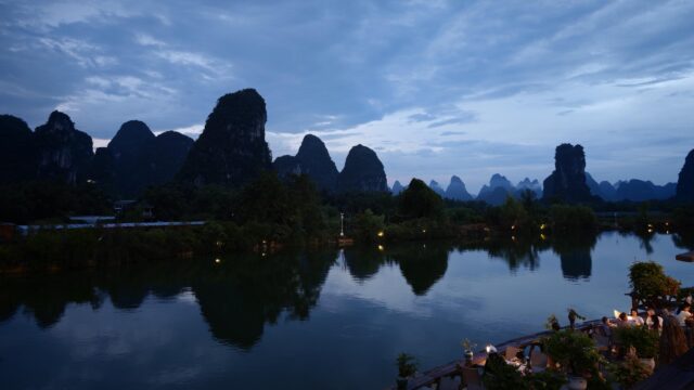 Evening View of Guilin Karst Mountains and Li River Riverside Cafe Desktop Wallpaper