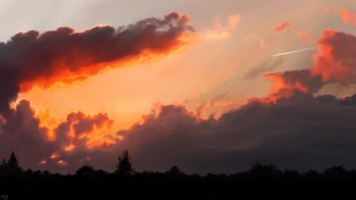 Dramatic Sunset Clouds Over Dark Silhouetted Forest Landscape 4K PC Wallpaper
