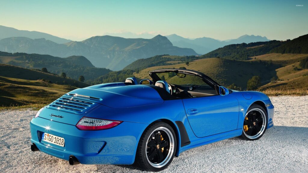 Blue Porsche 911 Speedster Convertible Parked in Scenic Mountains 4K Wallpaper