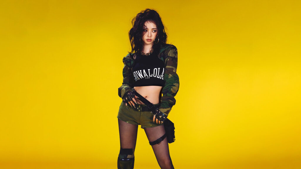 Stunning K-Pop Idol in Camouflage Streetwear Against Yellow Background 4K Wallpaper