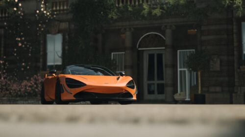McLaren 720S Orange Supercar Parked at Historic Estate PC Wallpaper