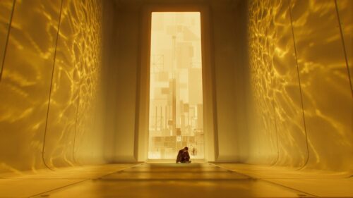 Solitary Figure in Abstract Futuristic Golden Corridor 4K Wallpaper