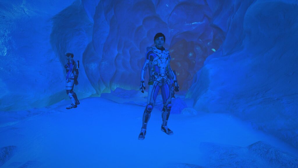 Futuristic Space Explorer in Blue Ice Cave 4K Desktop Wallpaper