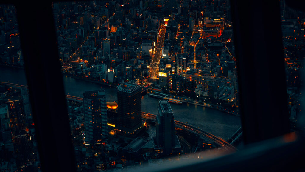 Stunning Tokyo Night Cityscape Overlooking Sumida River 4K Desktop Wallpaper
