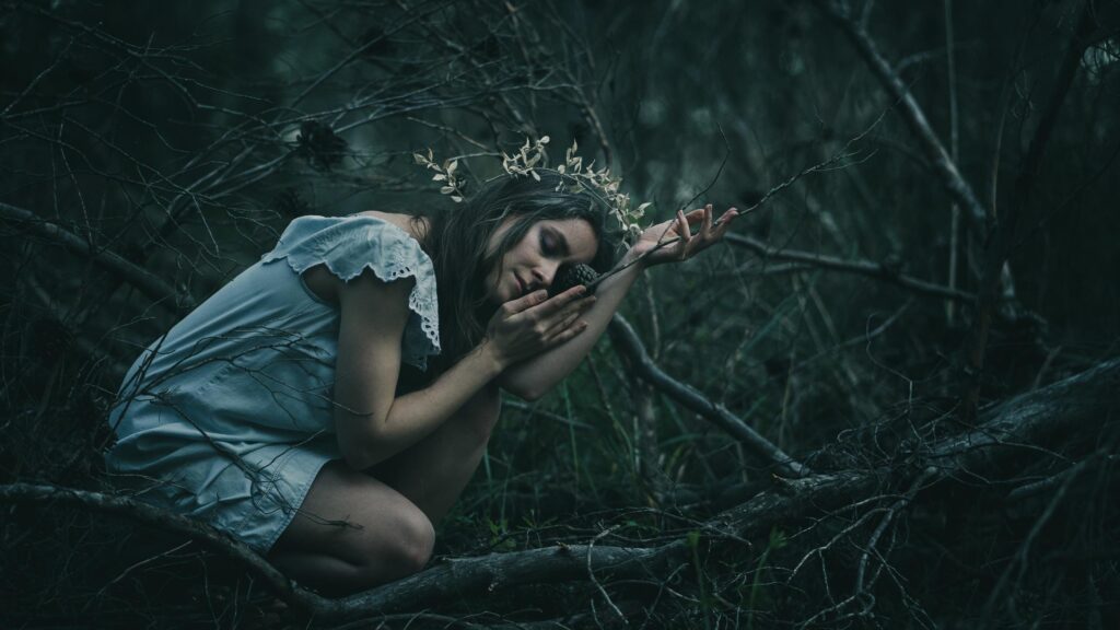 Ethereal Forest Nymph in Dark Woodland Atmosphere Desktop Wallpaper
