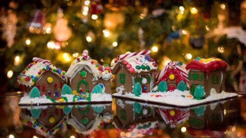 Festive Gingerbread Village with Christmas Lights Bokeh 4K Wallpaper