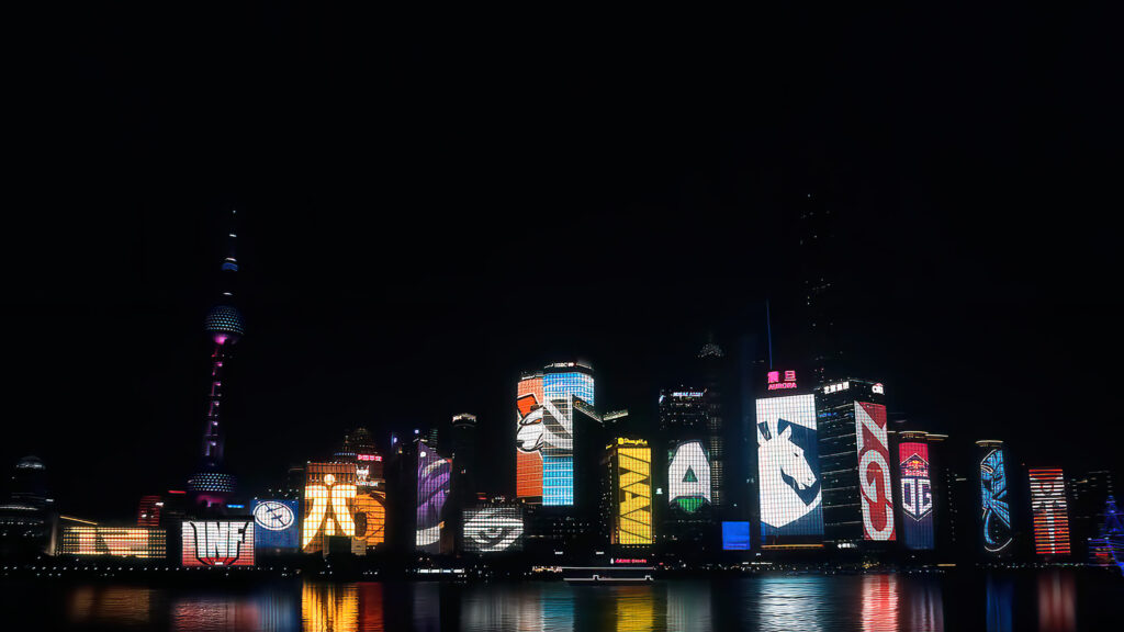 Stunning Shanghai Skyline at Night with Digital Esports Logos Desktop Wallpaper