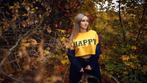 Beautiful Young Woman in Yellow Crop Top Posing in Autumn Forest Desktop Wallpaper
