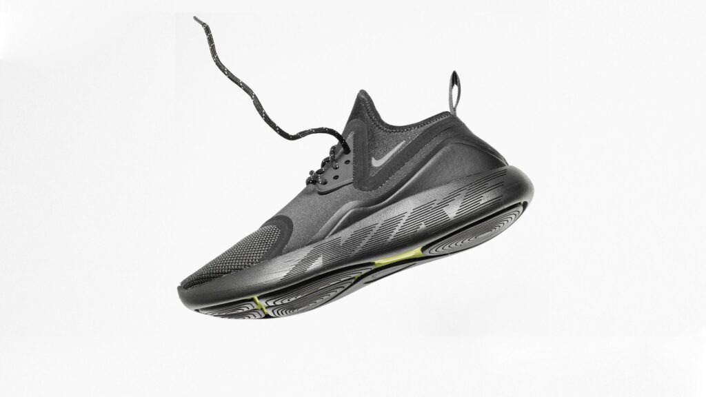 Minimalist Black Nike Training Shoe Floating Mid-Air High Resolution PC Wallpaper