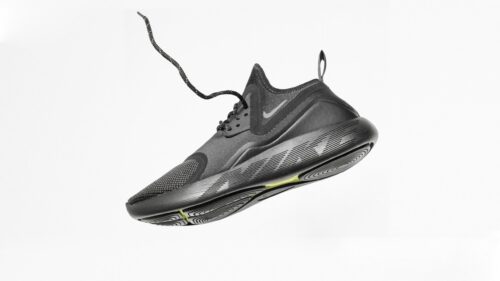 Minimalist Black Nike Training Shoe Floating Mid-Air High Resolution PC Wallpaper