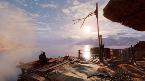 Assassin’s Creed Origins Warrior Sitting on Cliffside Overlooking Sea 4K Wallpaper