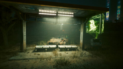 Cyberpunk 2077 Abandoned Desert Bus Stop with Neon Hologram 4K Wallpaper