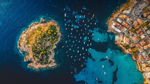 Aerial View of Mediterranean Island and Anchored Boats PC Wallpaper