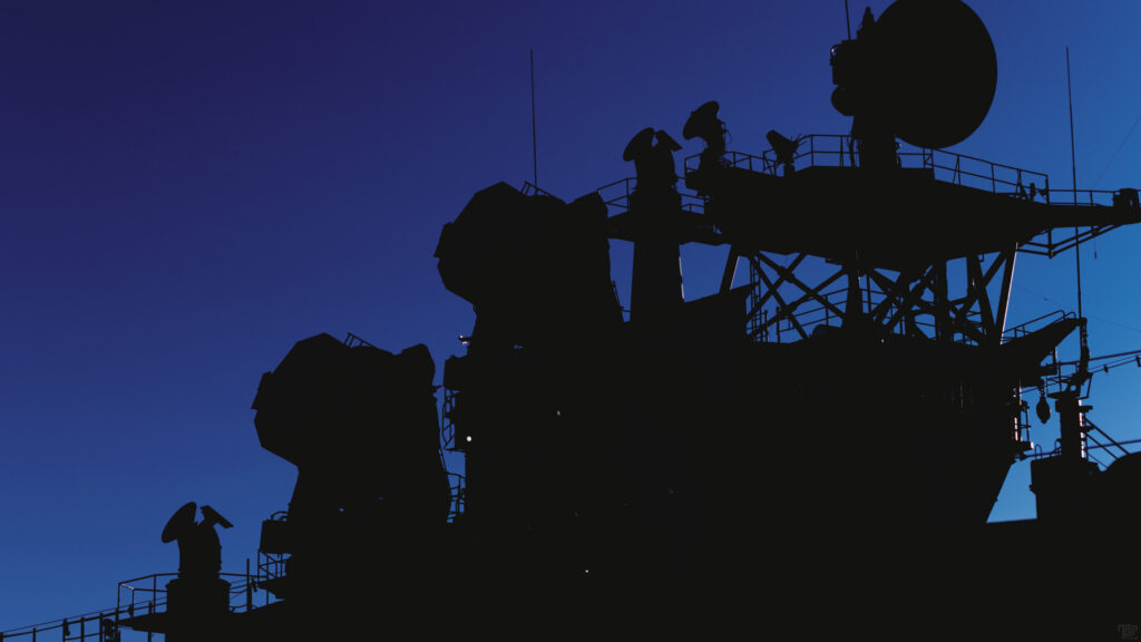 Silhouette of Warship Radar Towers at Sunset 4K Desktop Wallpaper