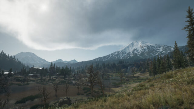 Stunning Snowy Mountain Valley Landscape with Overcast Sky PC Wallpaper