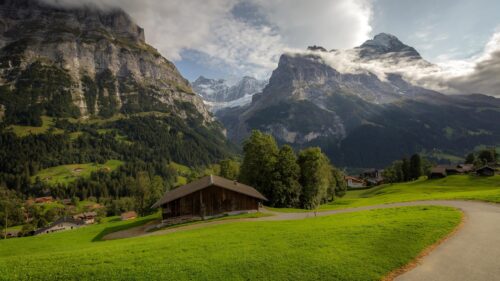 Breathtaking Swiss Alps Mountain Landscape and Wooden Chalet Desktop Wallpaper