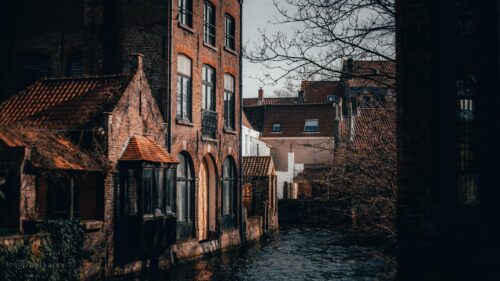 Bruges Canal Architecture in Moody Autumnal Light 4K Desktop Wallpaper