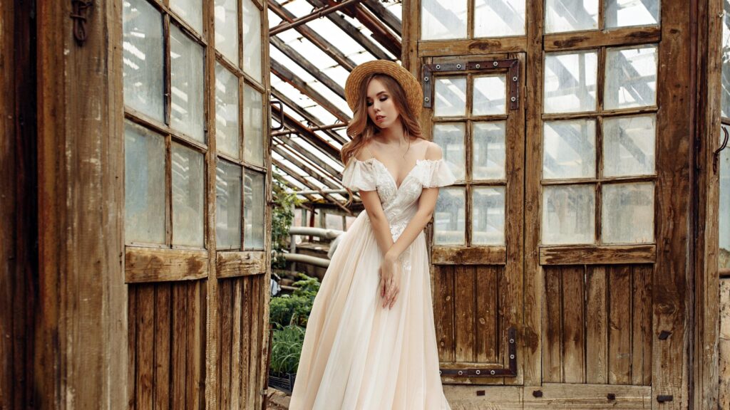 Elegant Woman in Wedding Dress Standing in Vintage Greenhouse 4K Wallpaper