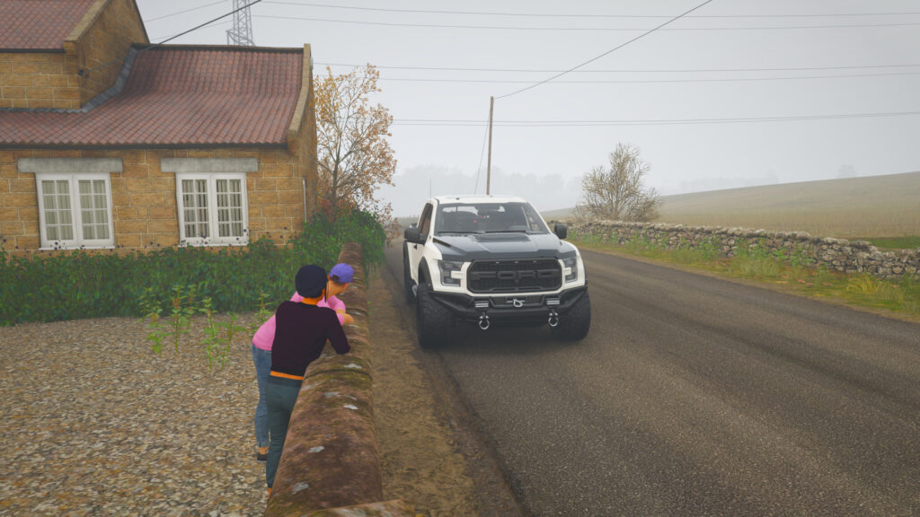 White Ford F-150 Raptor Parked by a Rural Cottage Desktop Wallpaper