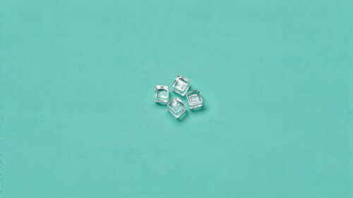 Minimalist Ice Cubes on Teal Background 4K Wallpaper