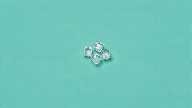 Minimalist Ice Cubes on Teal Background 4K Wallpaper