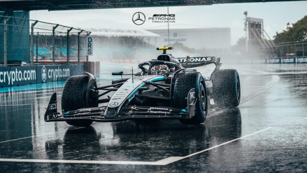 Mercedes-AMG Petronas F1 Car Driving in Heavy Rain 4K Wallpaper