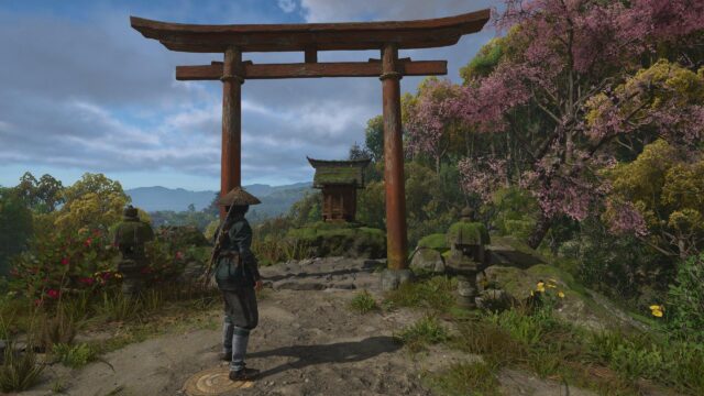Samurai Warrior Standing Before a Traditional Torii Gate in a Zen Garden 4K Wallpaper