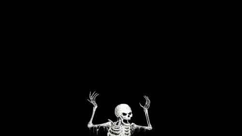 Minimalist Skeleton Rising from Darkness 4K Desktop Wallpaper