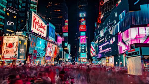 Vibrant Nighttime Times Square New York City Illuminated Cityscape 4K Wallpaper