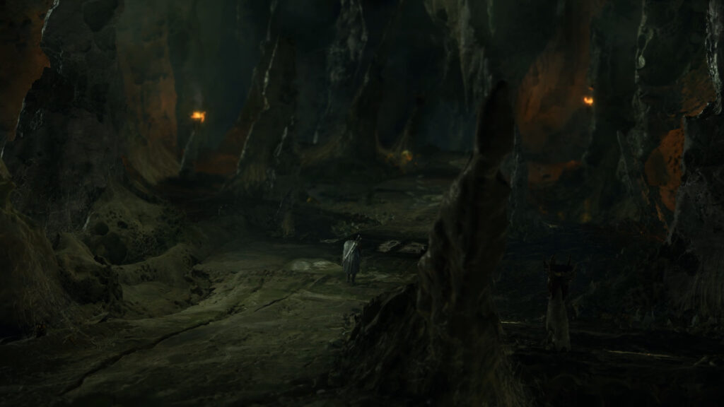 Lone Warrior Exploring a Dark Eerie Cave Fantasy 4K Desktop Wallpaper