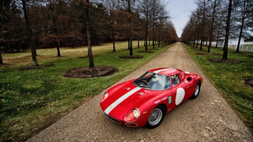 Stunning Red Vintage Ferrari 250 LM Racing Car on Country Drive Desktop Wallpaper