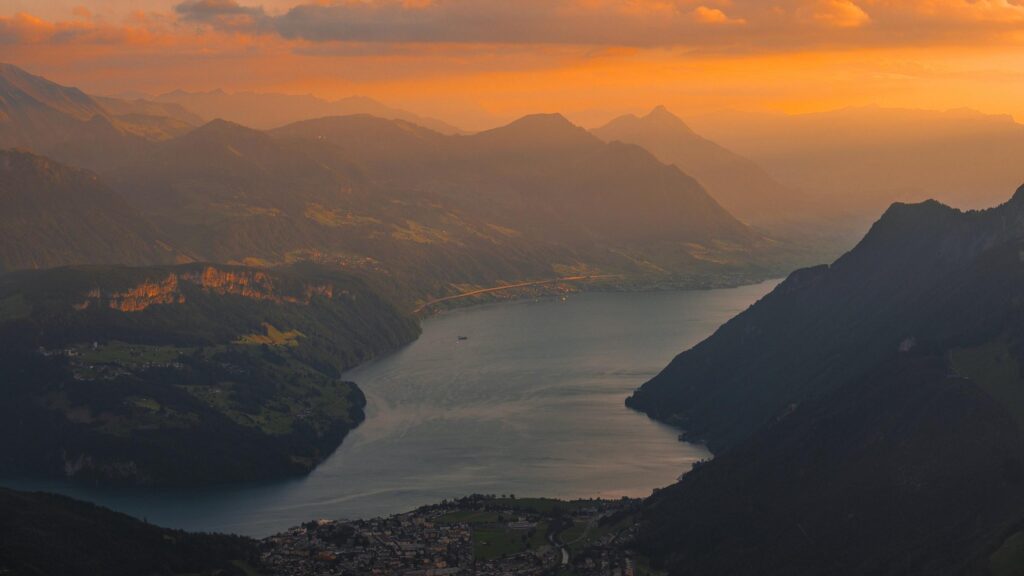 Stunning Swiss Alps Lake at Sunset Desktop Wallpaper