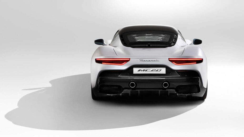 Stunning White Maserati MC20 Sports Car Rear View Desktop Wallpaper