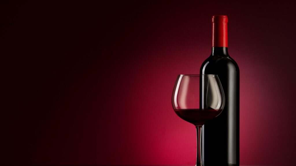 Elegant Red Wine Bottle and Glass Minimalist Desktop Wallpaper