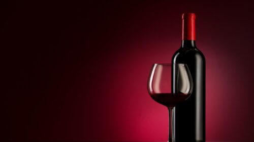 Elegant Red Wine Bottle and Glass Minimalist Desktop Wallpaper