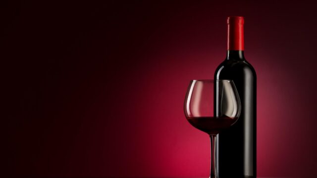 Elegant Red Wine Bottle and Glass Minimalist Desktop Wallpaper