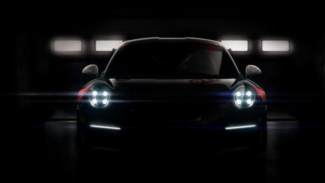 Minimalist Porsche 911 RSR Front View in Dark Garage 4K Desktop Wallpaper