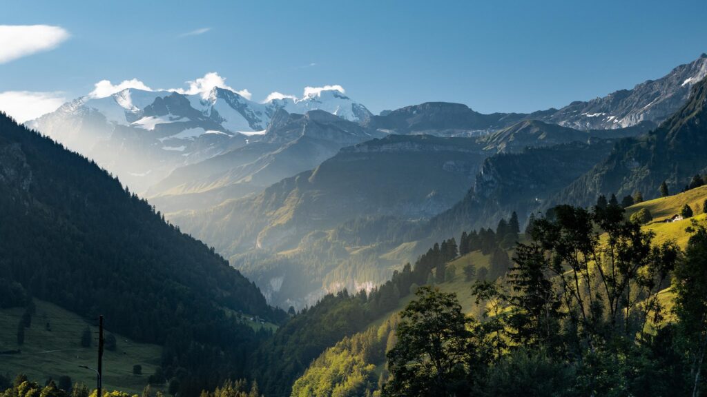 Breathtaking Swiss Alps Mountain Valley at Sunrise Desktop Wallpaper