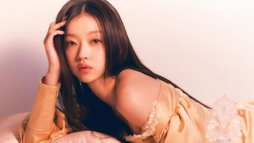 Stunning Portrait of a K-Pop Idol in a Golden Silk Dress 4K Desktop Wallpaper