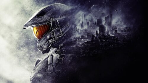 Master Chief Helmet Amidst Futuristic Destroyed Cityscape PC Wallpaper