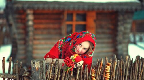 Young Girl in Traditional Russian Shawl with Red Berries Desktop Wallpaper