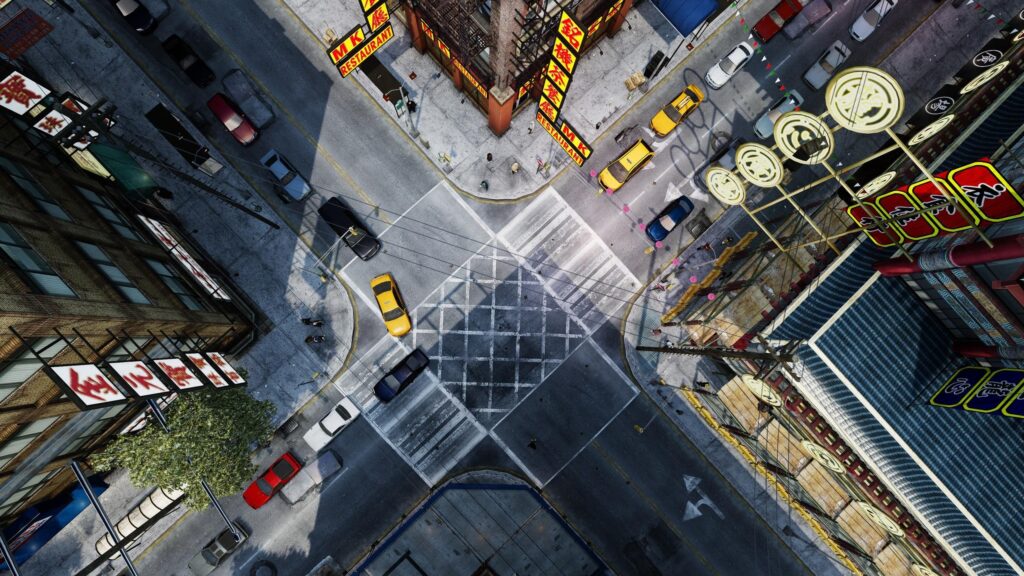 Aerial View of Busy Chinatown Intersection City Street 4K Wallpaper