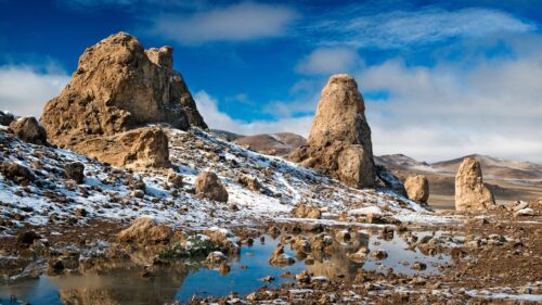 Stunning Trona Pinnacles Desert Landscape with Snow and Reflective Pools 4K Wallpaper